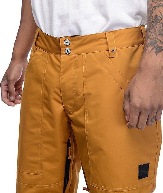 mustard track pants