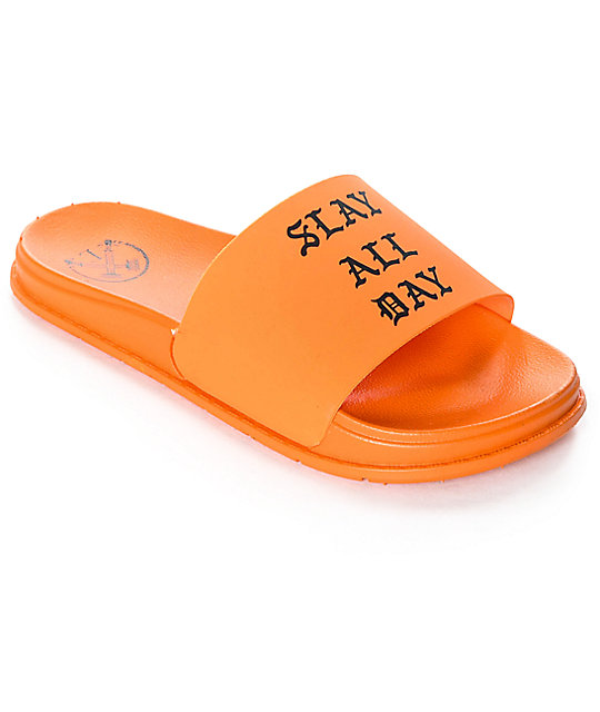orange slip on sandals