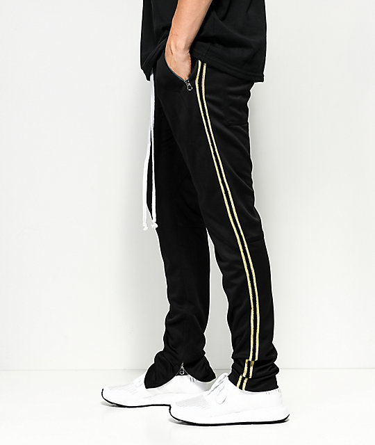 black and gold track pants