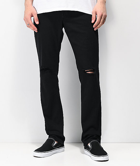 black jeans with knee slits