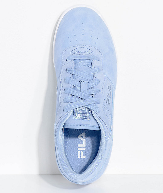 white and blue fila shoes