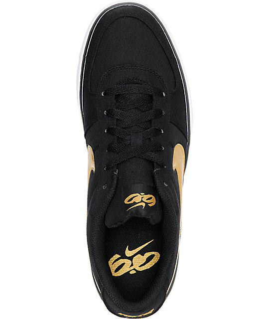 nike black gold shoes