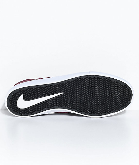 white and burgundy nike shoes