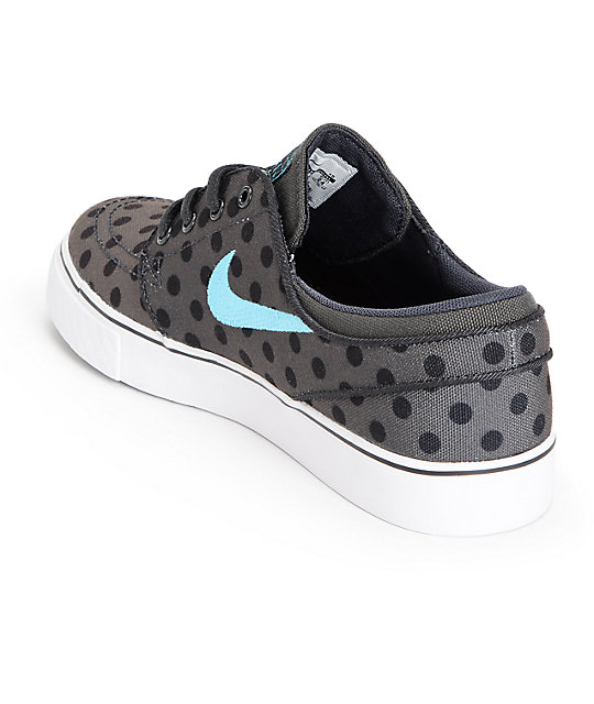 nike toki low leather