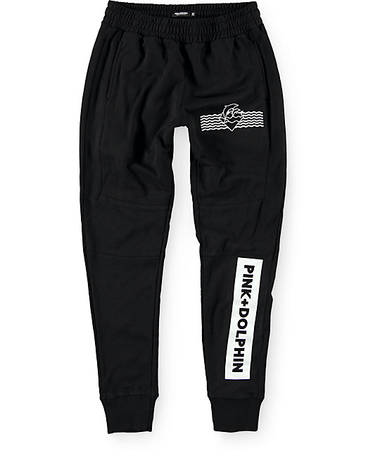 black sweatpants with pink dragons