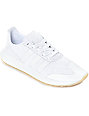 womans white adidas trainers