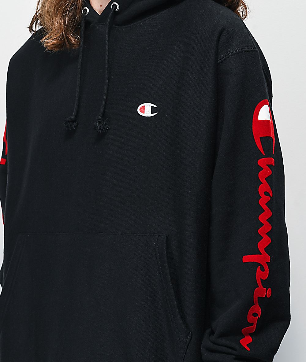 black champion hoodie with red logo