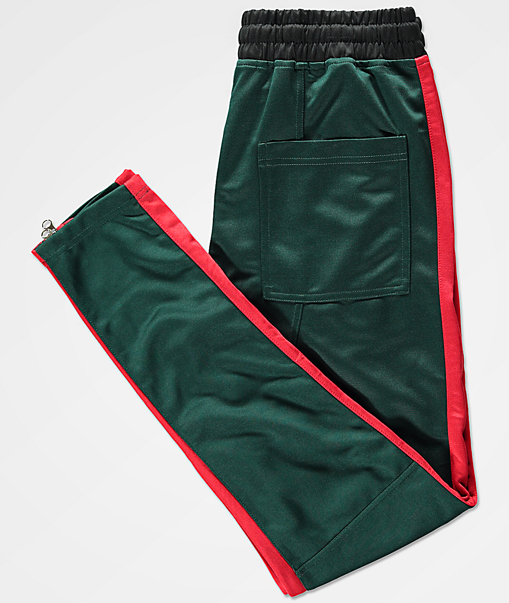 green with red stripe track pants