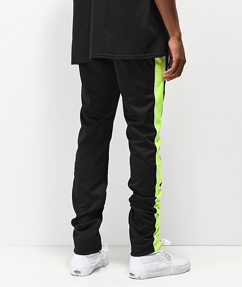 black trousers with green stripe