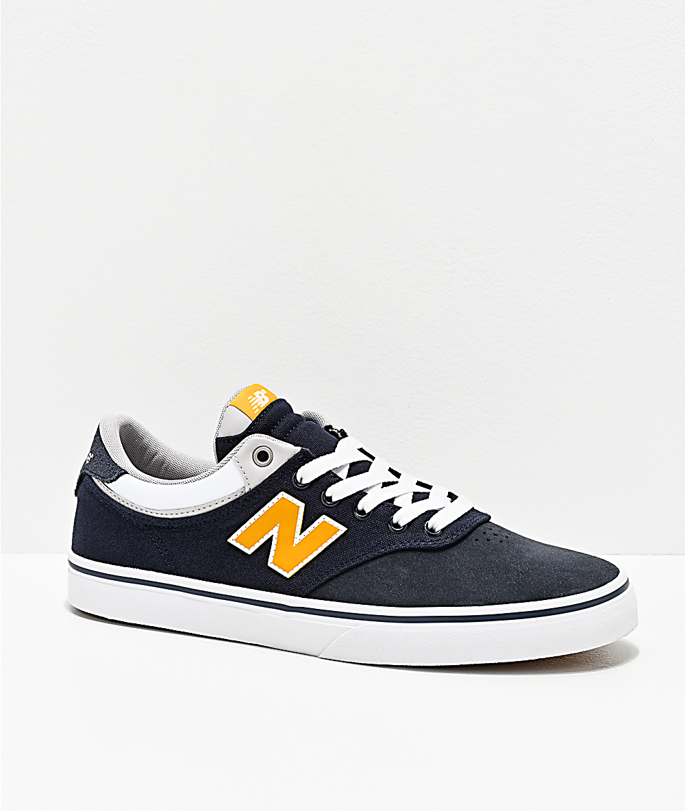 new balance navy gold
