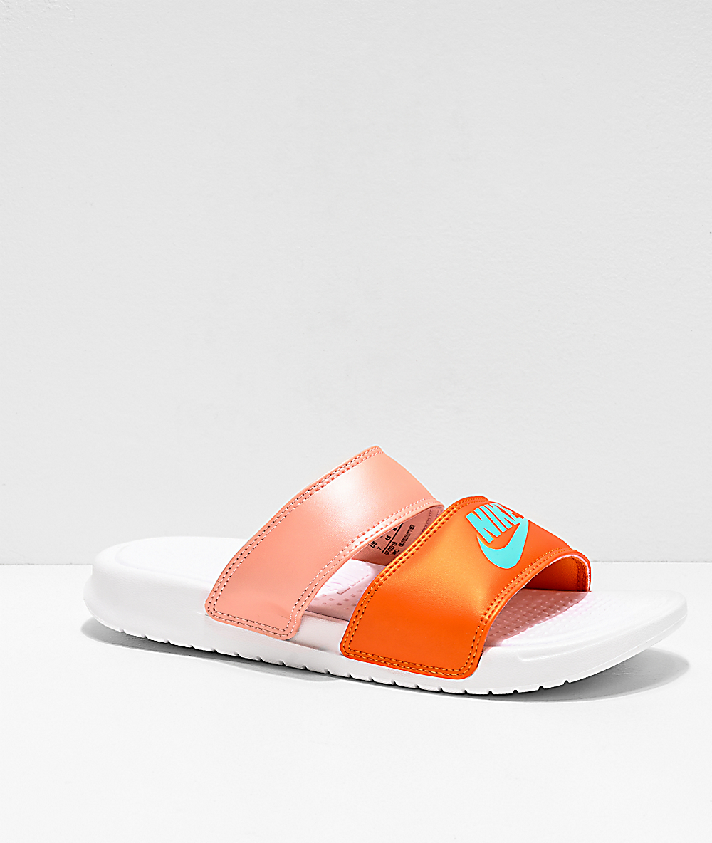 orange nike benassi slides