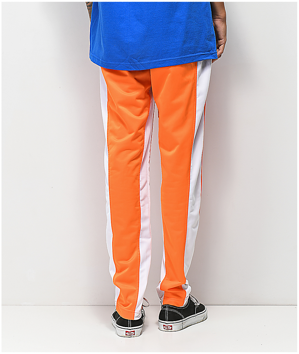 orange and blue track pants