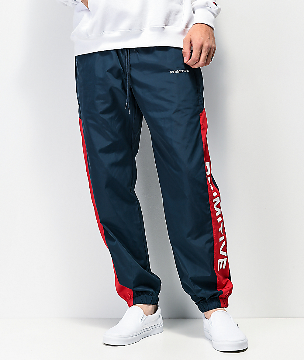 red nylon track pants