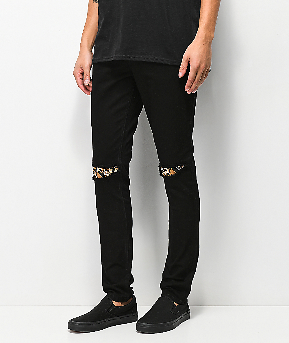 black jeans with patches