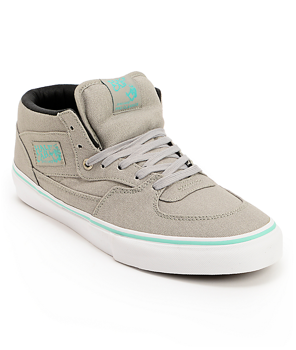 grey and turquoise vans