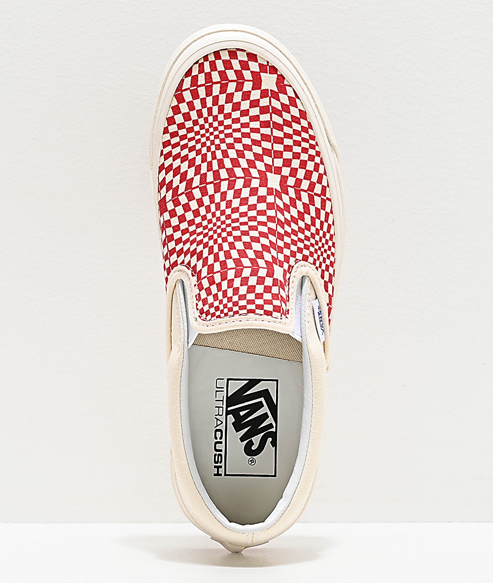 cream checkerboard vans