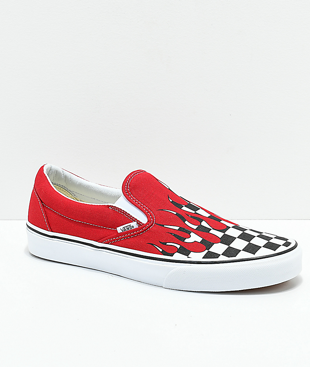 checkerboard slip on vans with red drip 
