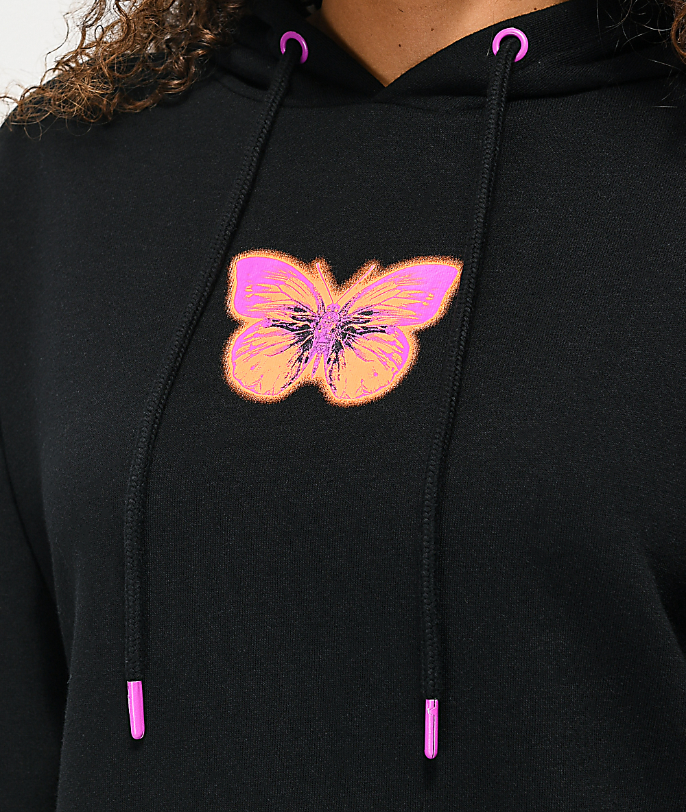 black hoodie with orange butterfly