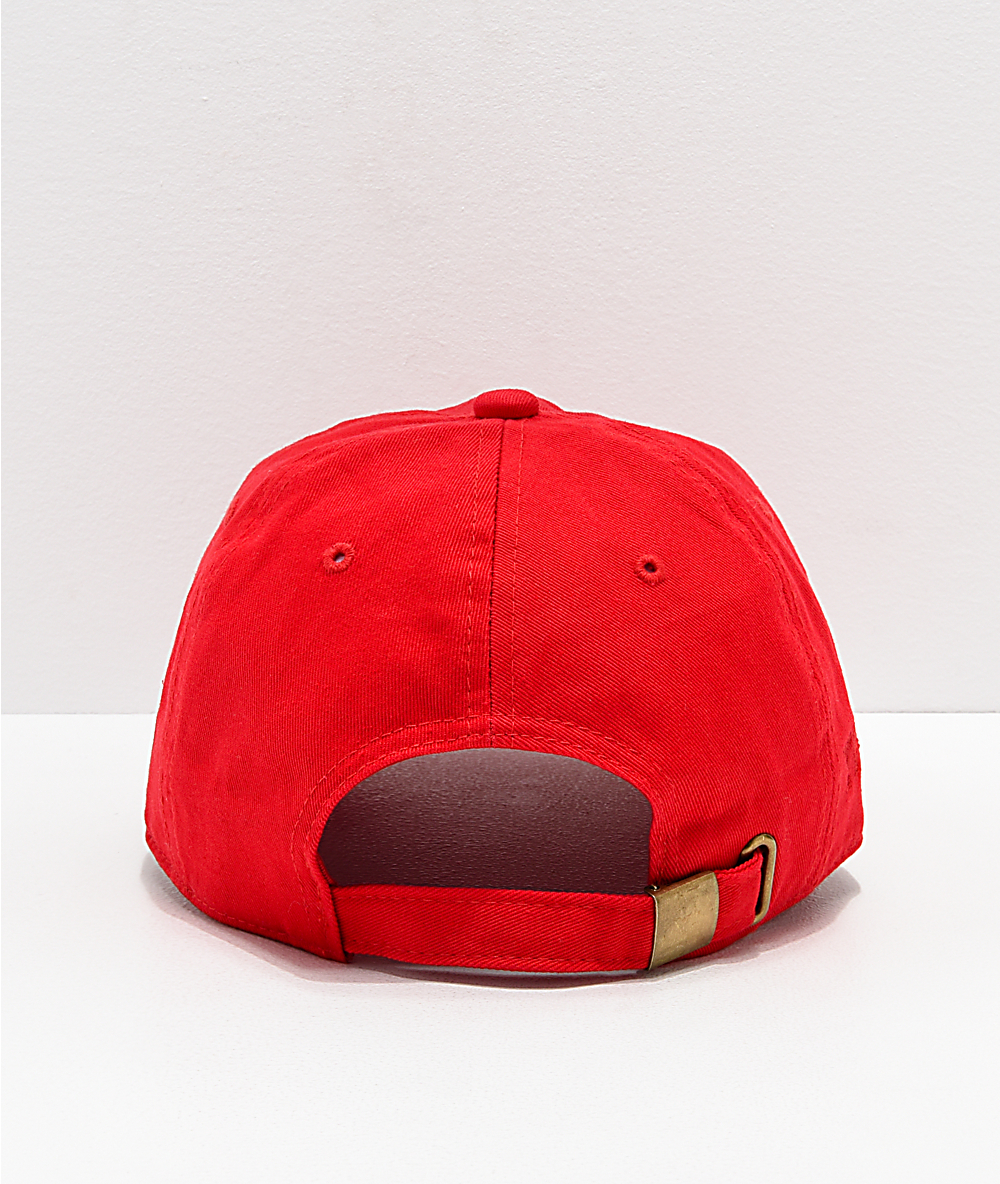 red strapback cap