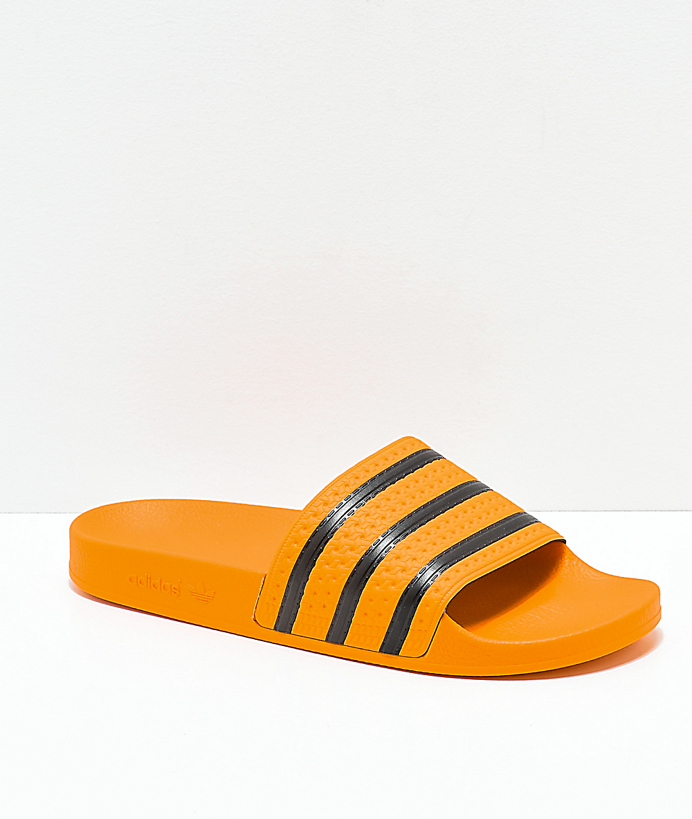 Buy > yellow adidas slides > in stock