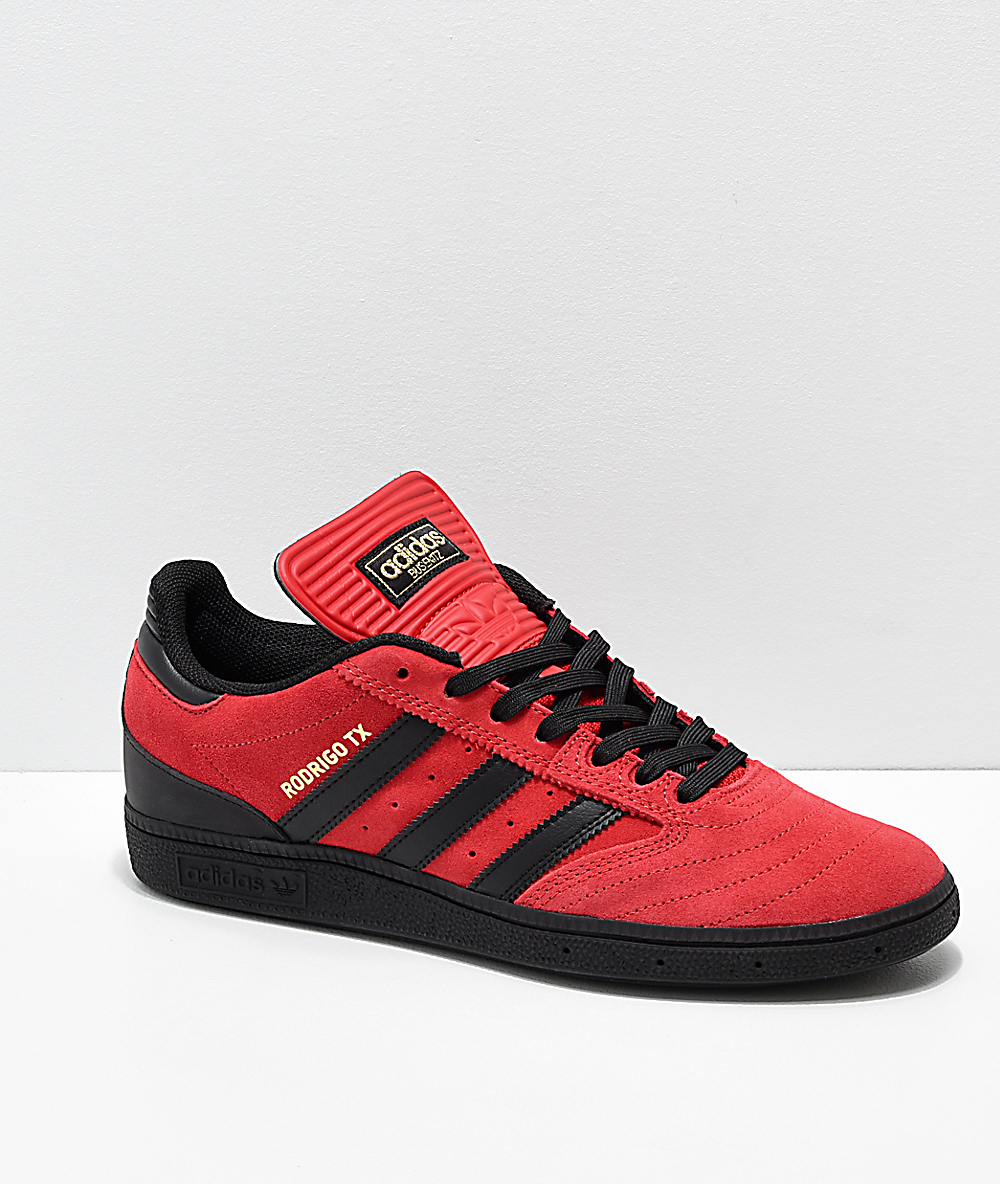 red and black adidas sneakers