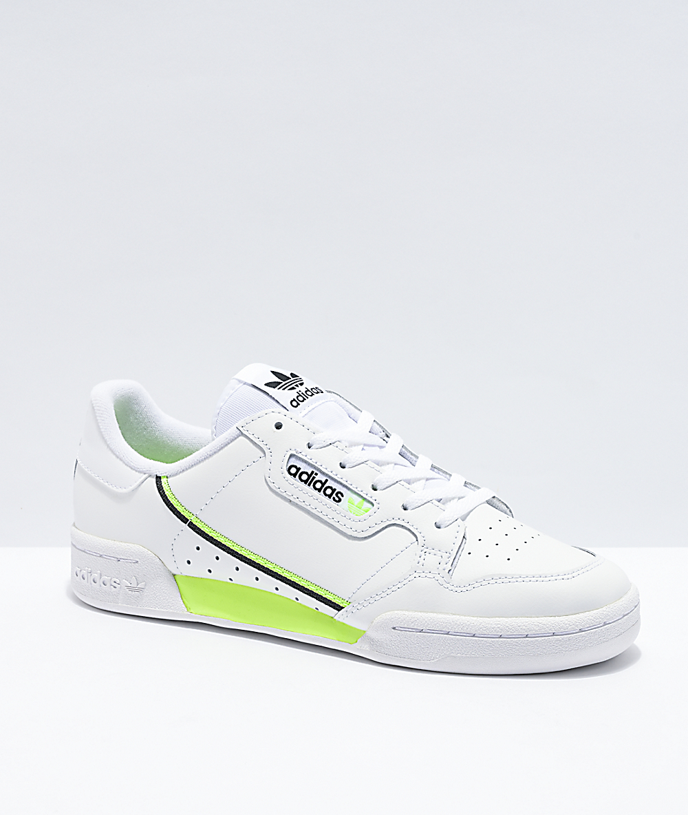 green and white sneakers