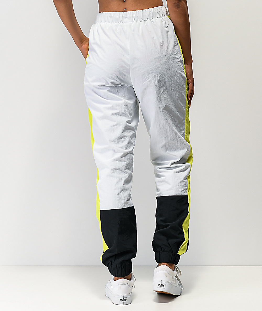 yellow black and white track pants