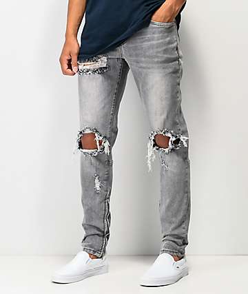 grey jeans with holes