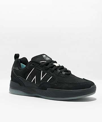 all black sneakers new balance