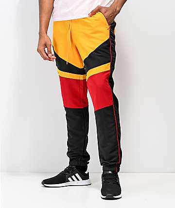 blue and yellow track pants