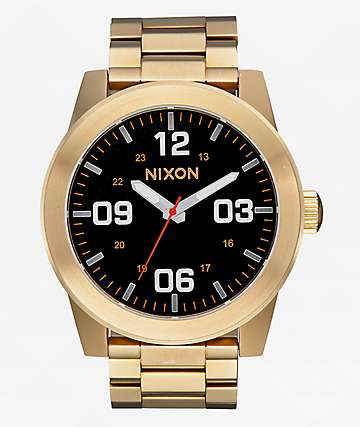 Nixon gold best sale watch white face