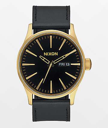 Nixon cannon gold black best sale