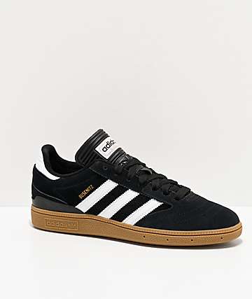 black adidas shoes with white sole