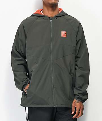 adidas Dekum chaqueta cortavientos empaquetable negra y naranja