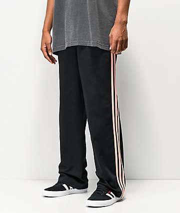 adidas x Nora pantalones chinos negros y rosas de 3 rayas
