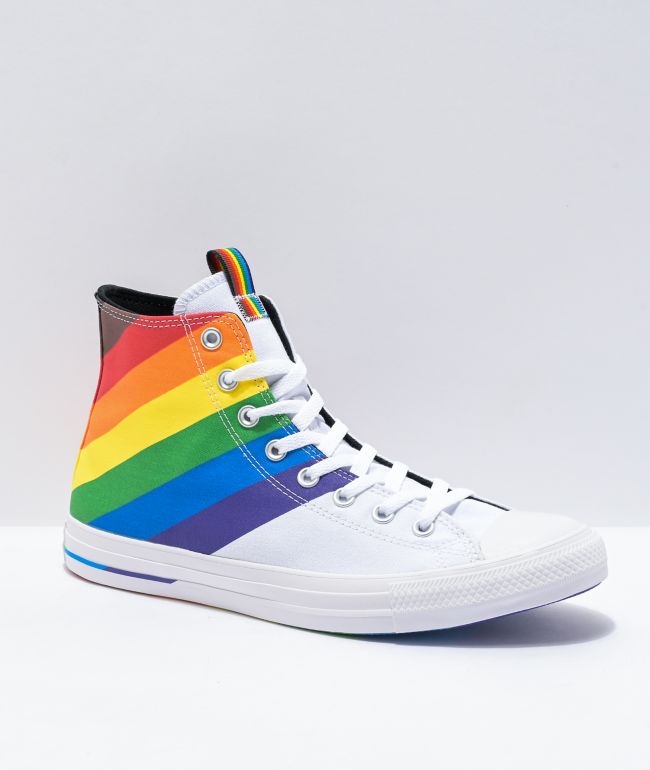 white converse with rainbow bottom
