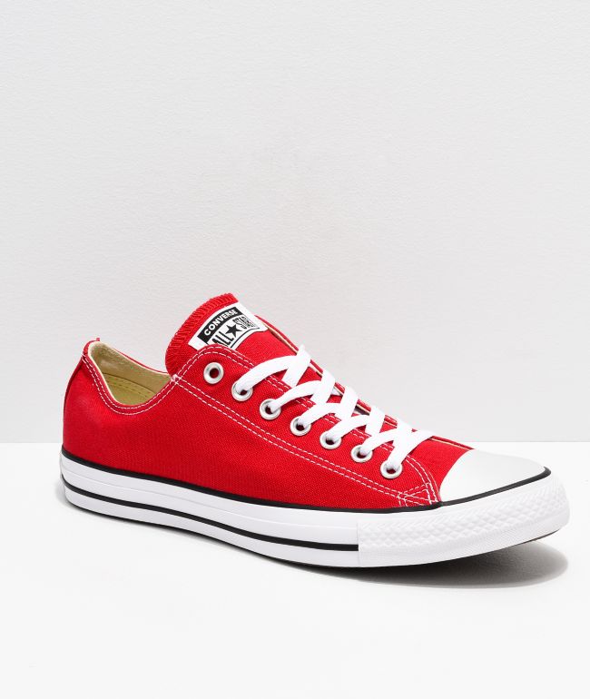 white and red chuck taylors