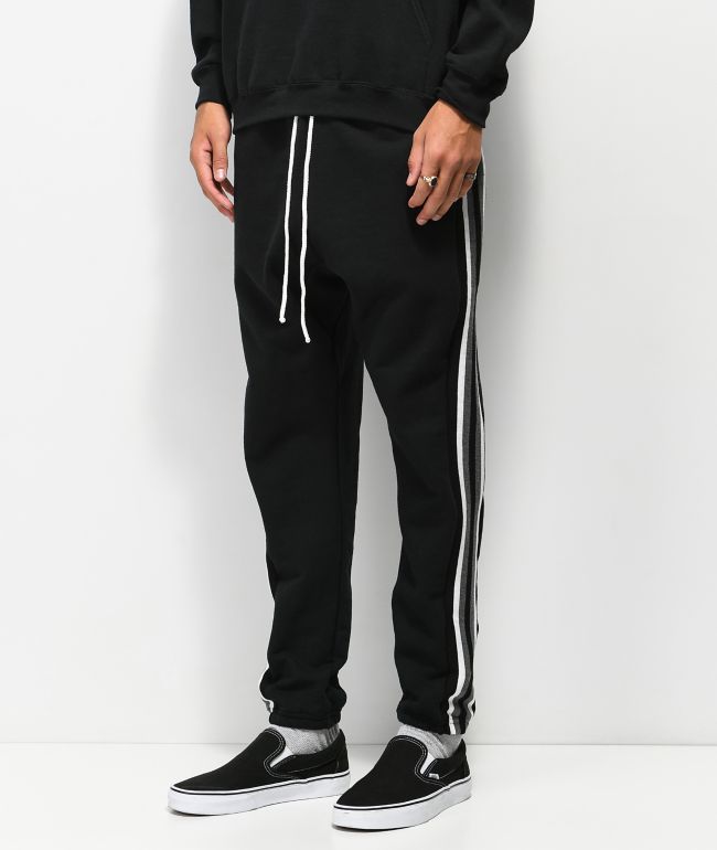 black joggers with white stripe