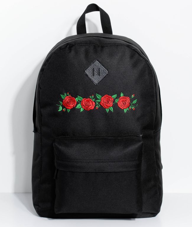 black backpack with roses