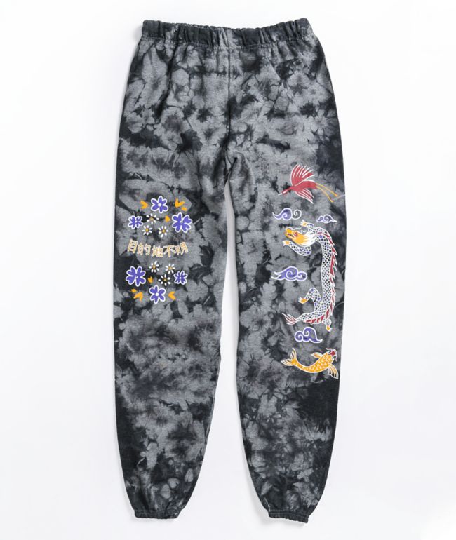 black sweatpants with pink dragons