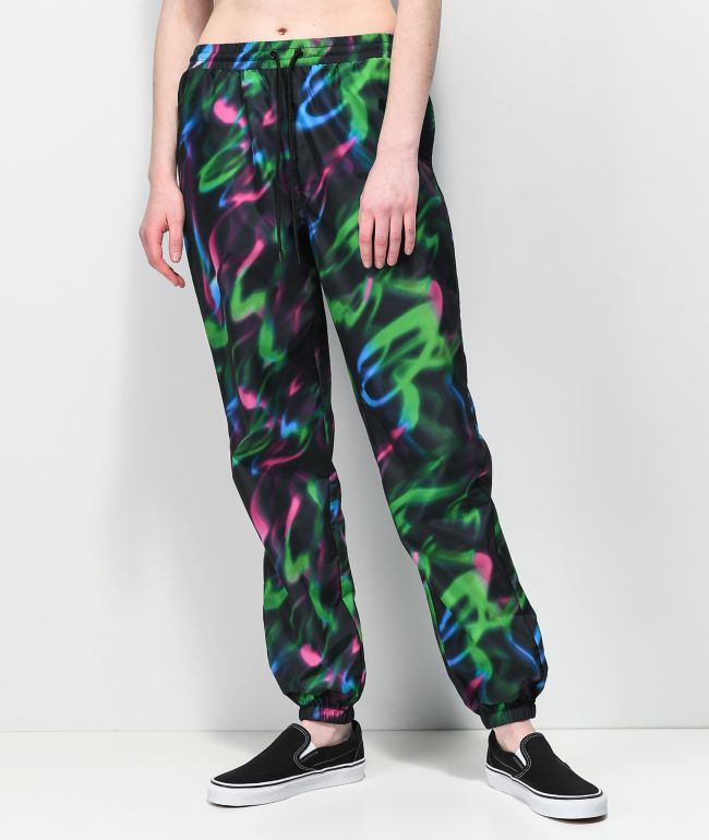 green and blue track pants