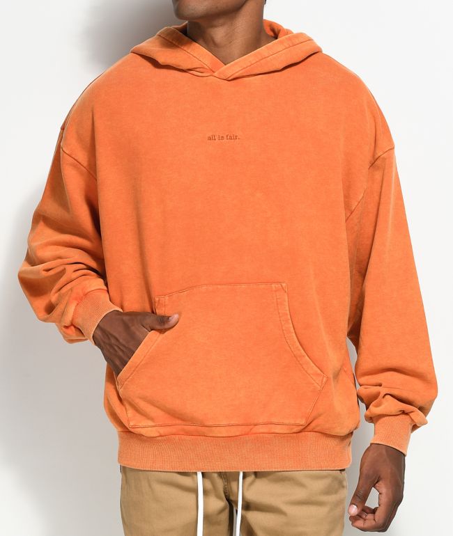 oversized orange sweatshirt