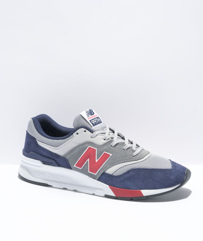 gray and blue new balance shoes