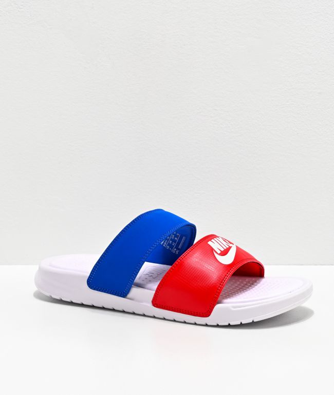 red white and blue nike slides