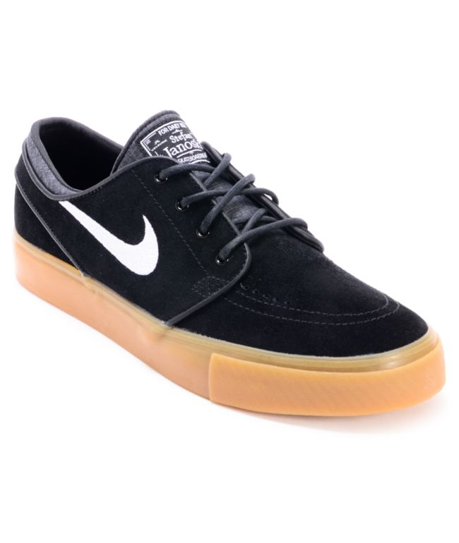 sb zoom janoski trainers in black with gum sole