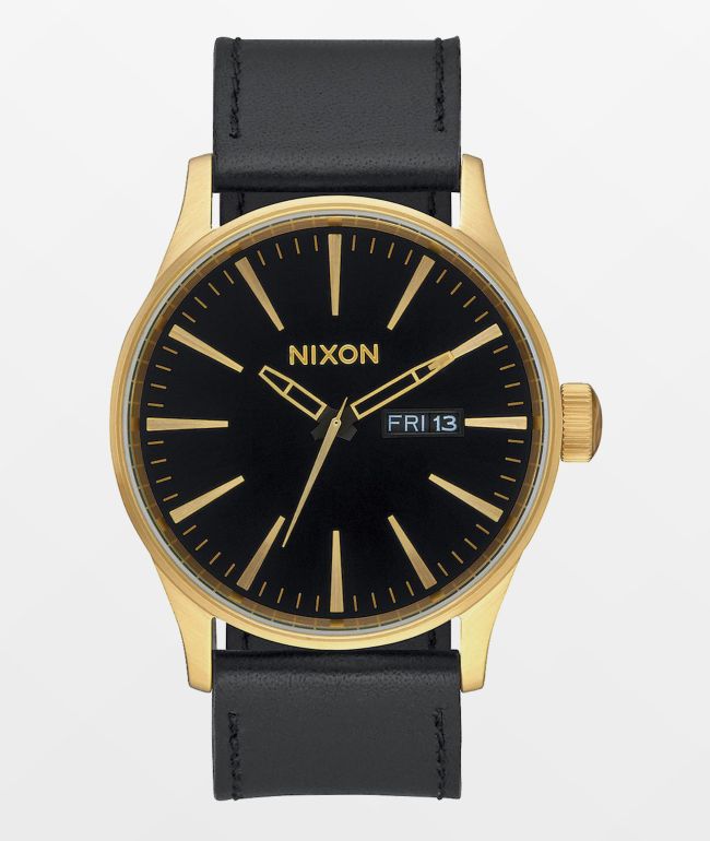 Nixon Sentry Leather reloj analógico en negro y color oro