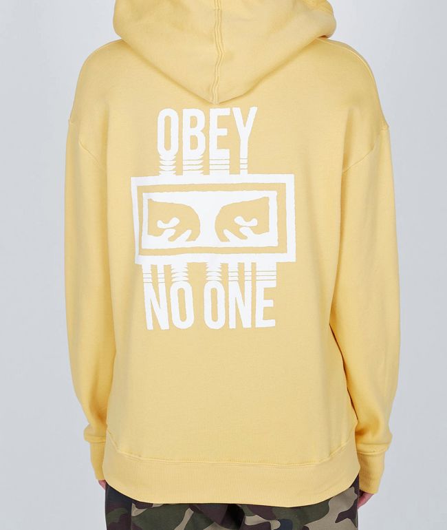 obey yellow sweater