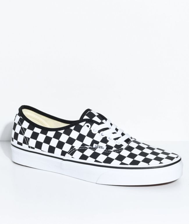 black and off white checkered vans