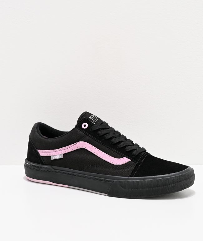 Black vans best sale with pink stripe