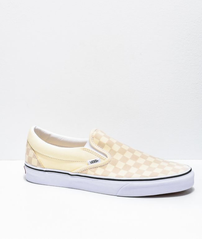 black and cream checkerboard vans